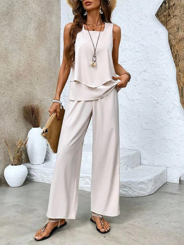 Flat lay of the sleeveless blouse and wide-leg pants two-piece set in striped print