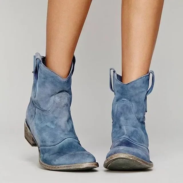 Side profile of women's cowboy boots highlighting the leg-lengthening heel shape
