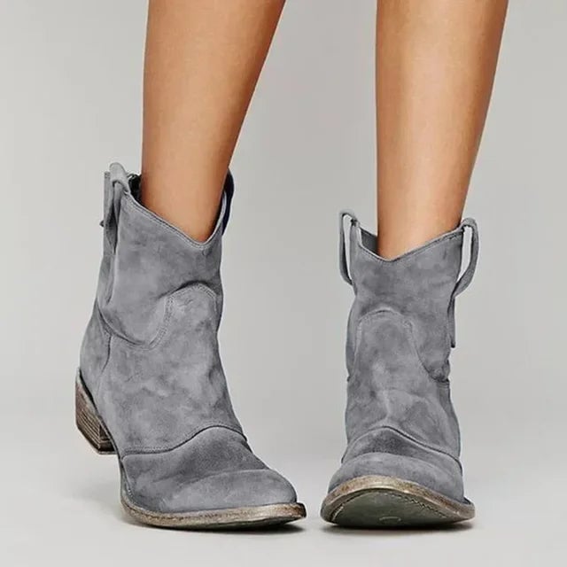 Abigail boots in pink colorway, perfect for adding a bold Western touch to any outfit