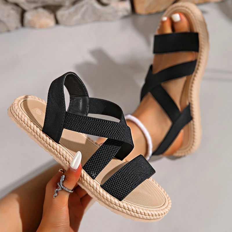 Lifestyle flat-lay of Adele espadrille sandals styled with a summer outfit