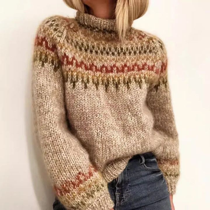 Model wearing the Adelina elegant sweater in a minimalist silhouette, shown in a neutral colorway