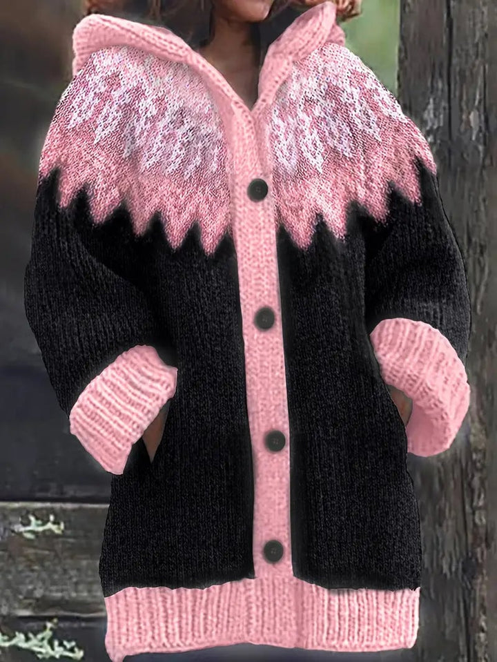 Model wearing the Adeline cardigan in green, showing the comfortable hood detail