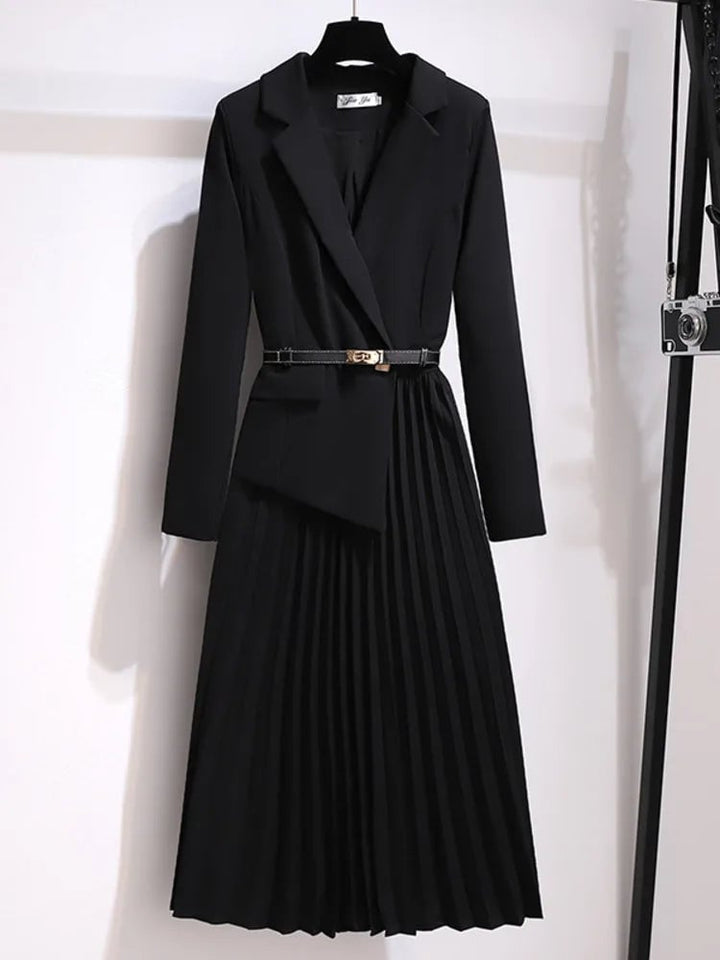 Full-length back view of the Adrienne belted pleated midi dress in black with long sleeves