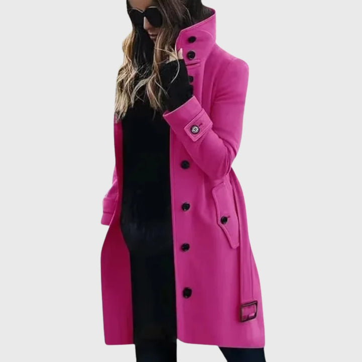 Model wearing the long trench coat in red, paired with ankle boots for a stylish fall outfit