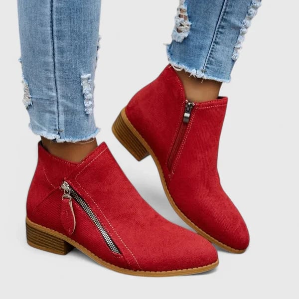 Front view of the Ainsley orthopedic boot styled with casual denim for an everyday look