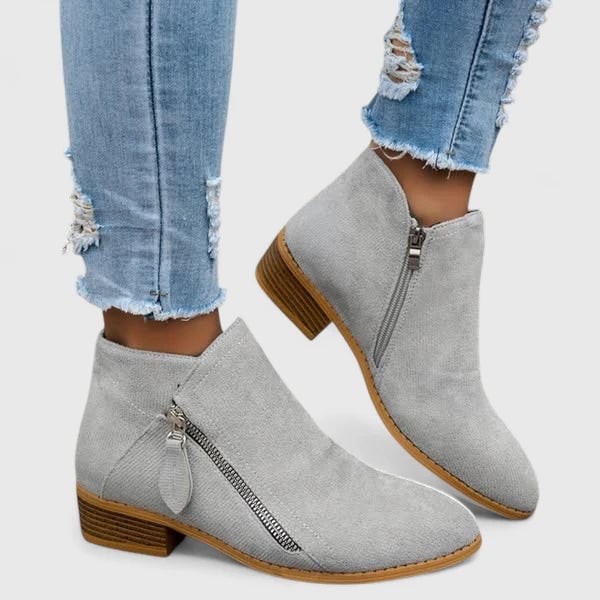 Overhead flat-lay of the Ainsley orthopedic boot pair showcasing its classic versatile silhouette