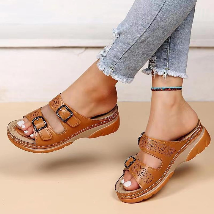 Ainsley women's orthopedic adjustable sandals in brown with cushioned footbed and sleek straps, front view