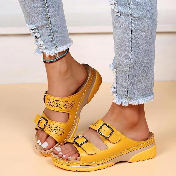 Ainsley adjustable sandals in light blue colorway on white background, top-down view