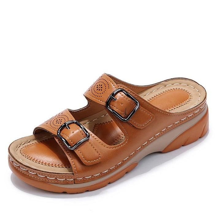Ainsley women's sandals in yellow with minimalist strap design, angled front view
