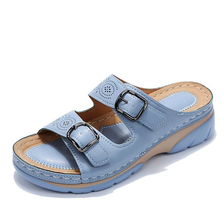 Ainsley orthopedic sandals in navy blue on a clean white surface, side view