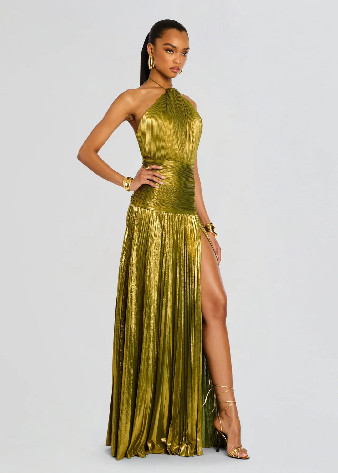 Side view of the Alana green maxi dress showing its elongating, figure-flattering cut