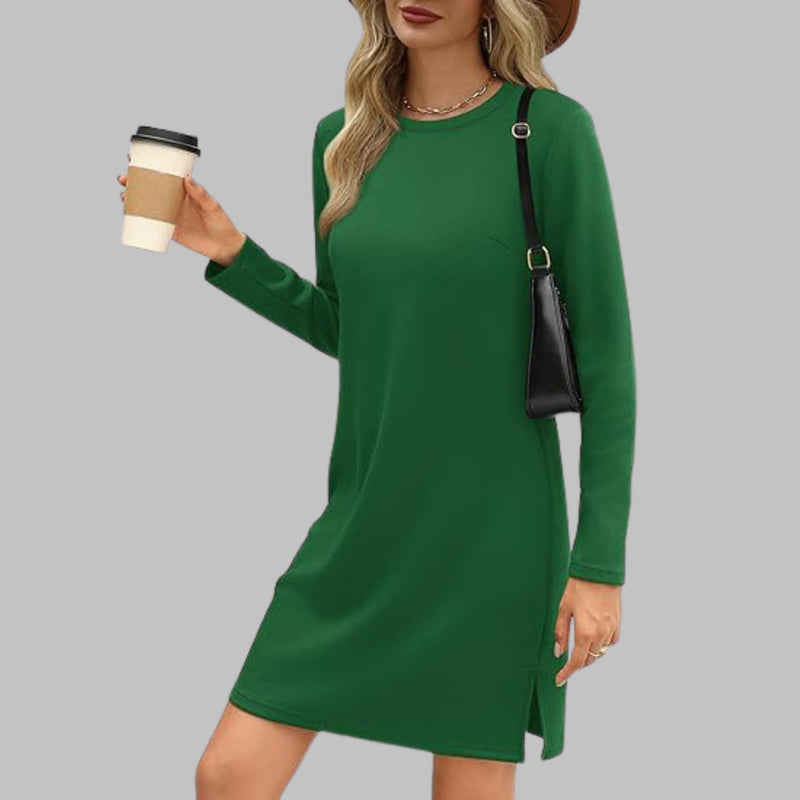 Side view of a long sleeve round neck dress highlighting the slim fit and tummy coverage