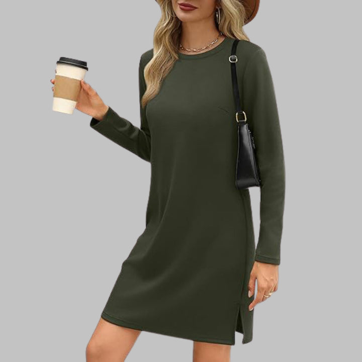 Army green long sleeve round neck dress worn by a woman showing full length silhouette
