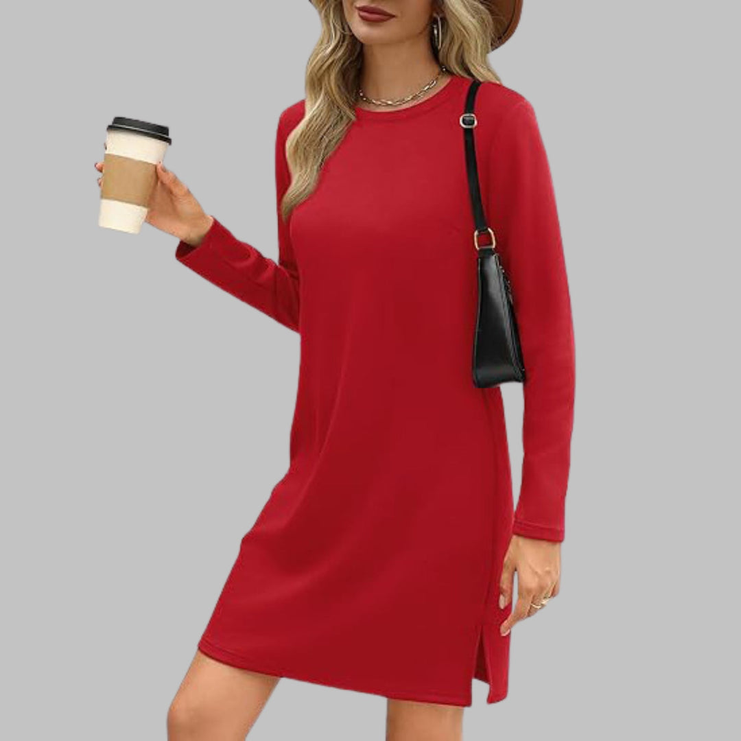 Woman in a red long sleeve round neck dress with a confident everyday style