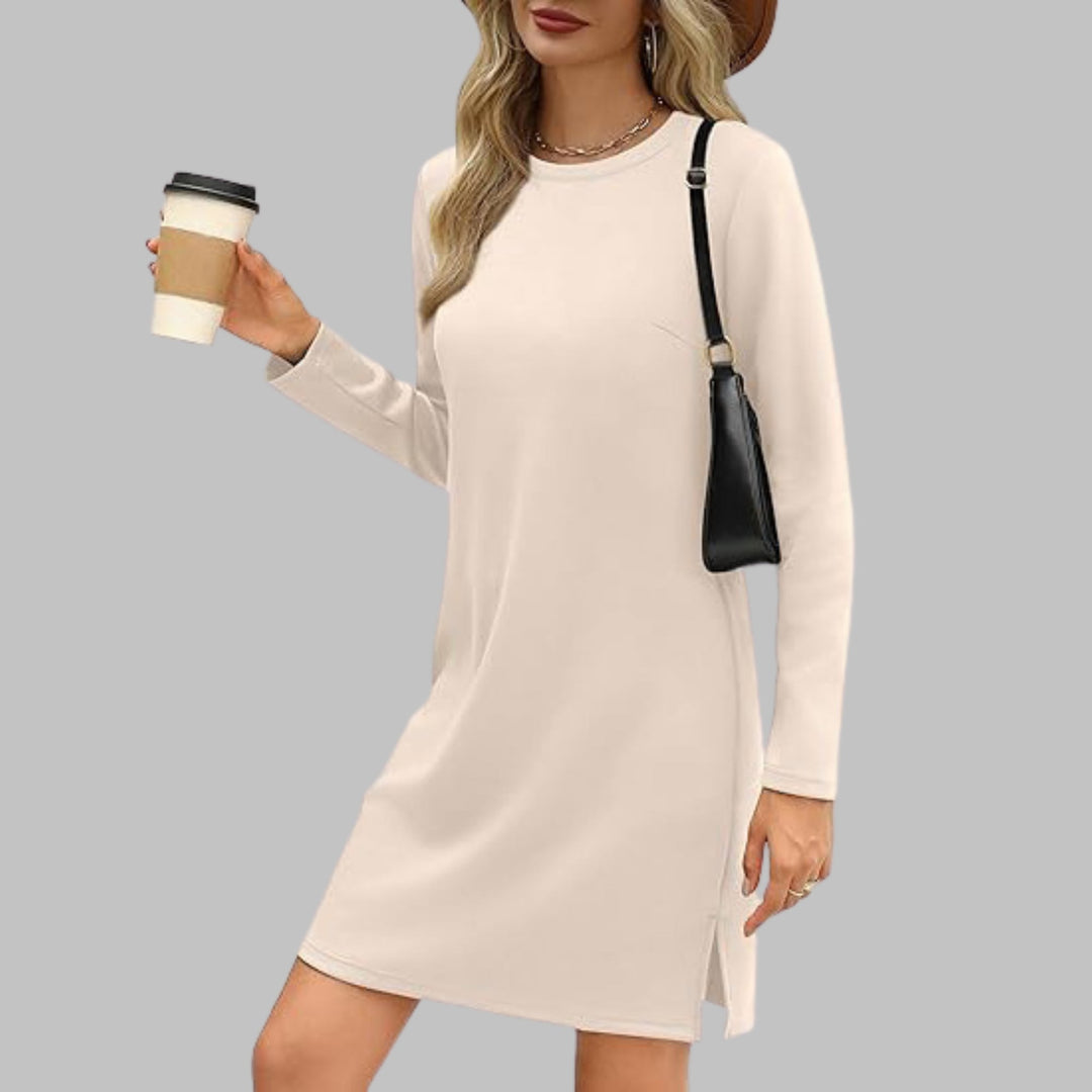Beige long sleeve round neck dress on a model showing clean minimal styling