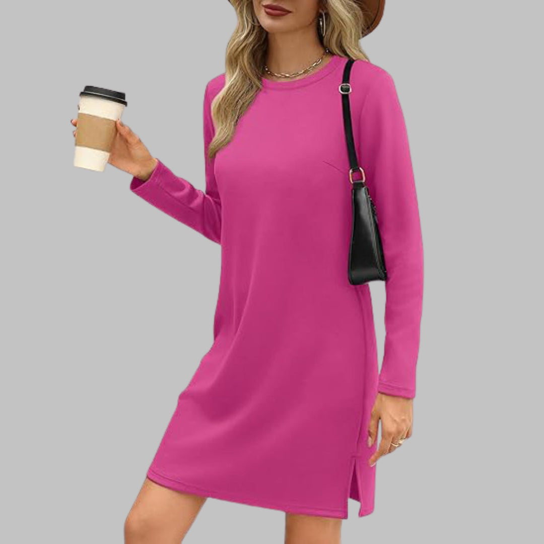 Woman wearing the long sleeve round neck dress in a lifestyle setting showcasing versatile everyday wear