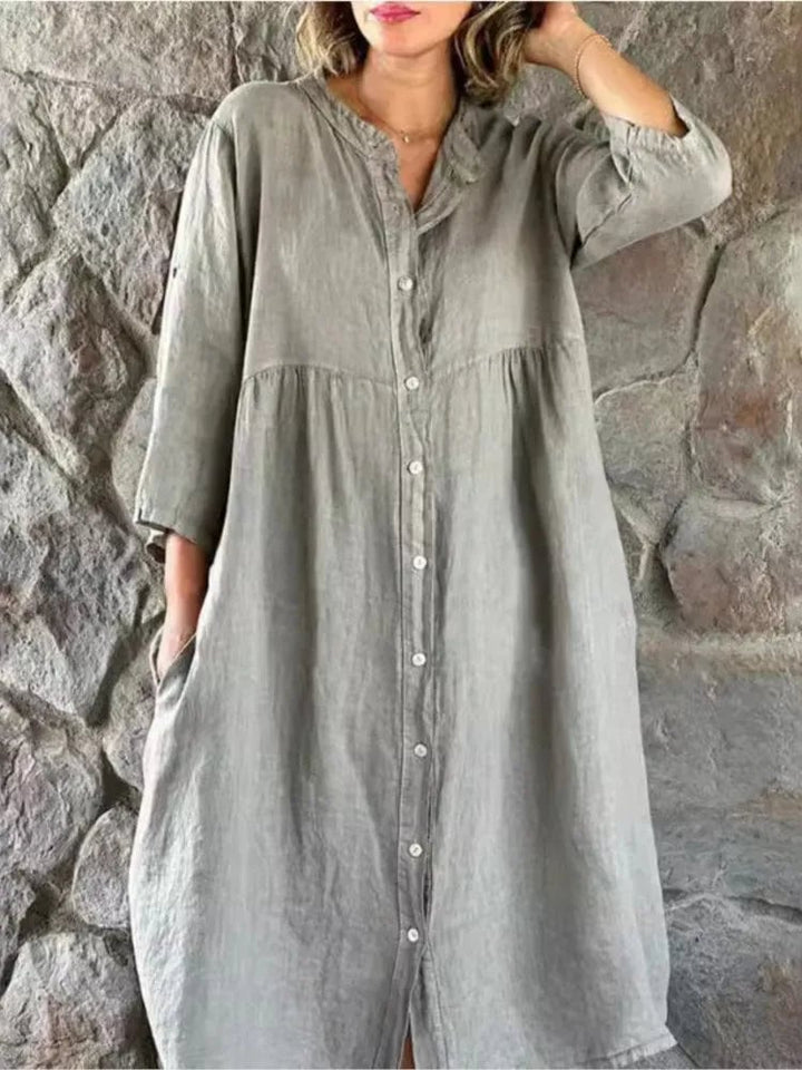 Close-up detail of the Alba shirt dress band collar and button-front closure in gray