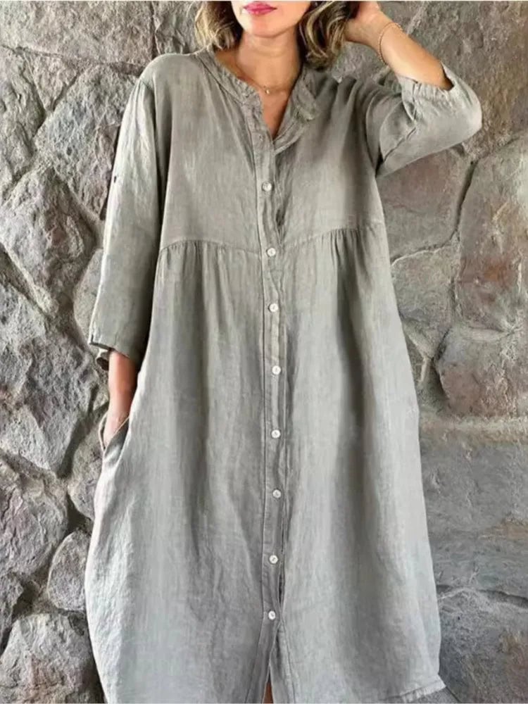 Close-up detail of the Alba shirt dress band collar and button-front closure in gray