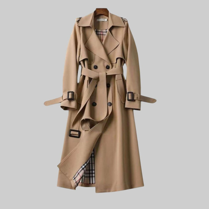 Front view of the Aleah classic trench coat in beige with a tailored belted silhouette
