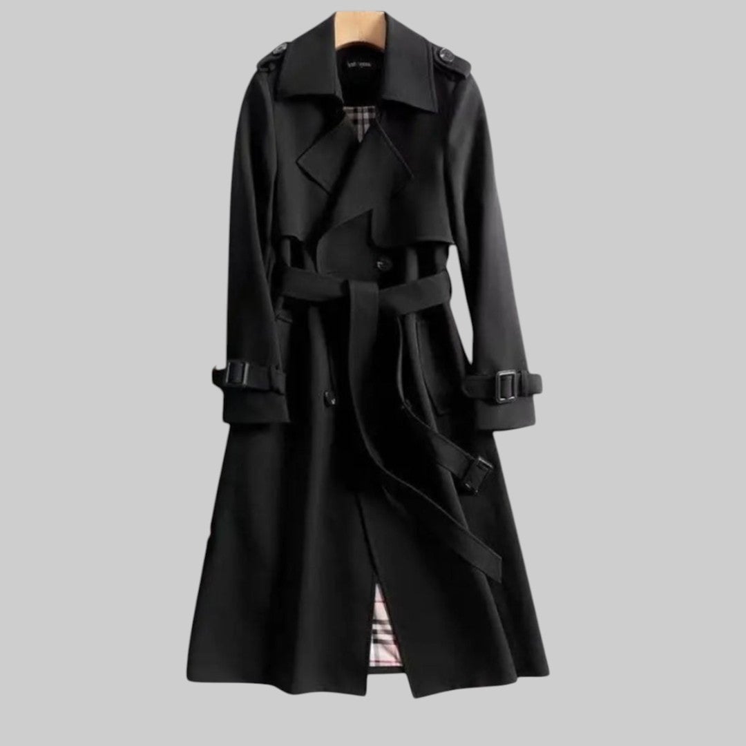 Model wearing the Aleah classic trench coat styled over casual denim