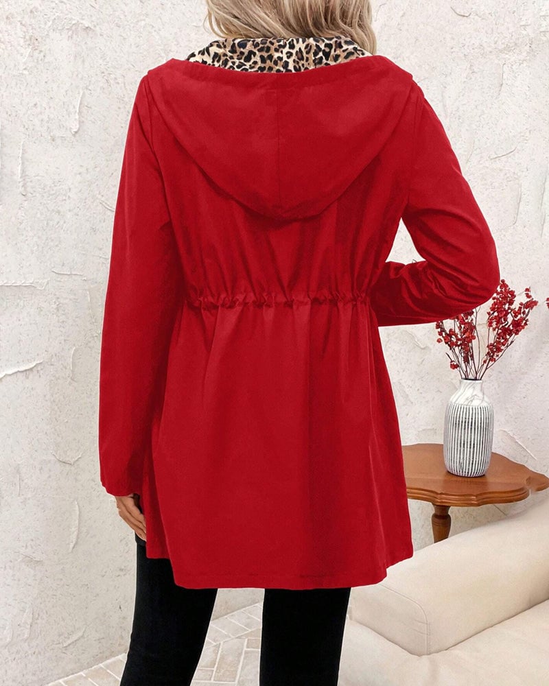 Side profile of the Aleah reversible coat in white showing flattering draped fit