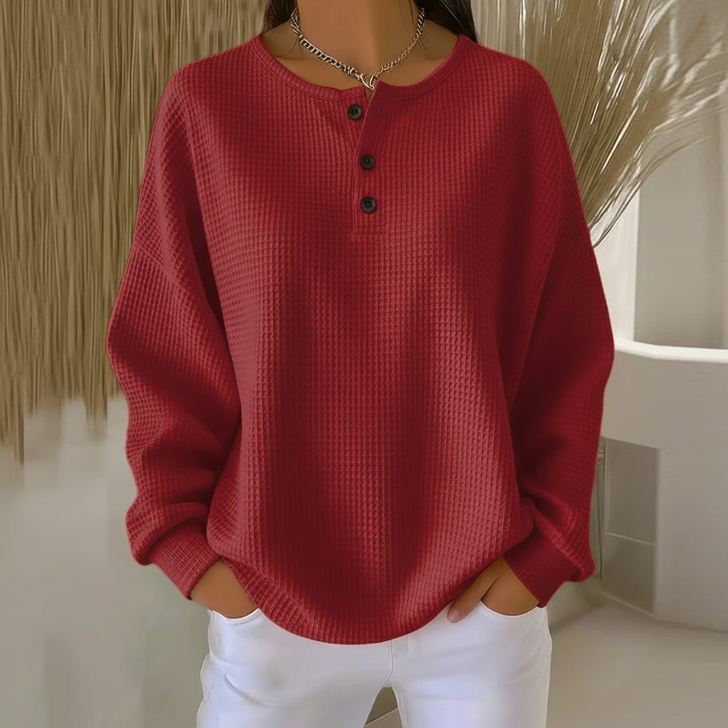 Close-up of the soft waffle knit fabric texture on the Alexa sweater
