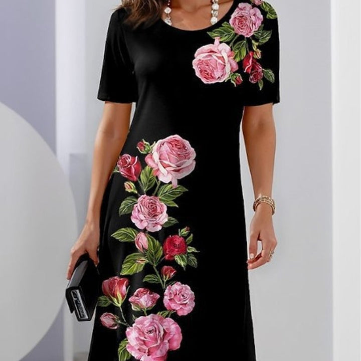 Side profile of a woman wearing a white floral A-line dress highlighting the flowing skirt