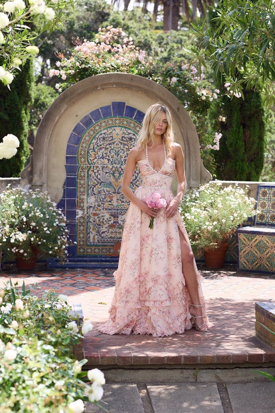 Close-up of the pleated puff skirt fabric and pink floral tapestry pattern on the Scarlette dress