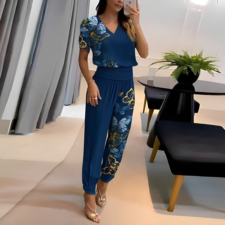 Close-up of the puff sleeve and elastic cuff detail on a trendy two-piece set in blue