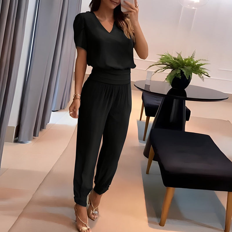 Florimay trendy two-piece set shown in black, featuring puff sleeves and a relaxed yet polished fit