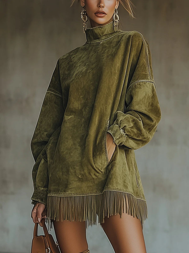 Front view of olive green faux suede fringe hem dress with turtleneck neckline on a model