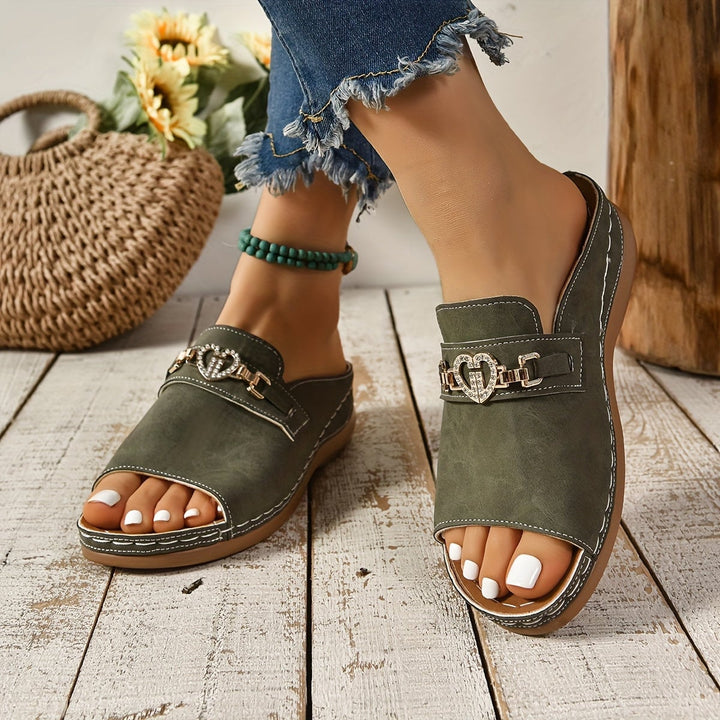 Alexandra sandals in khaki displayed at a three-quarter angle showing sole and strap