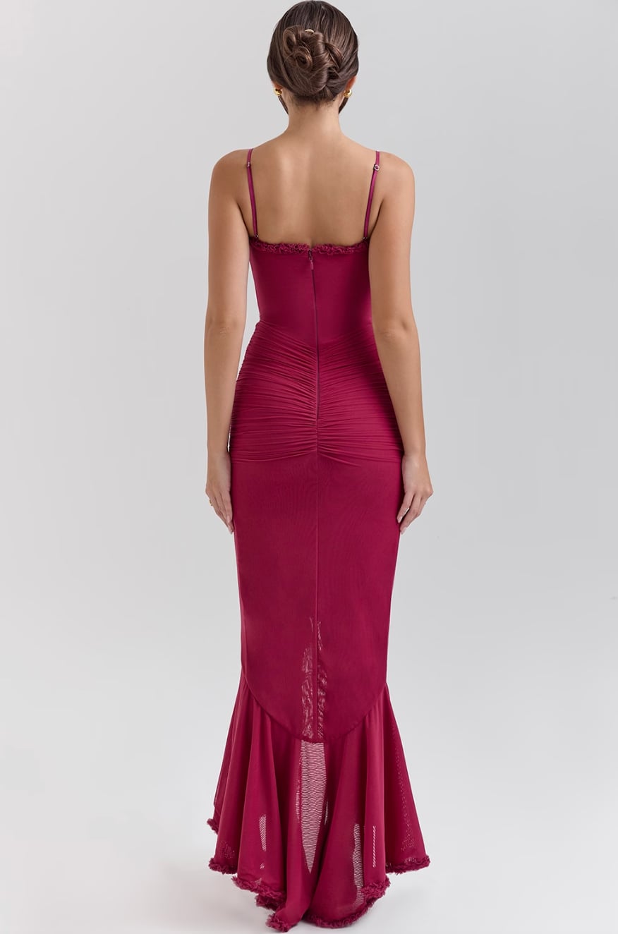 Flat lay of the Alexandra lace ruched dress showing dovetail hem silhouette