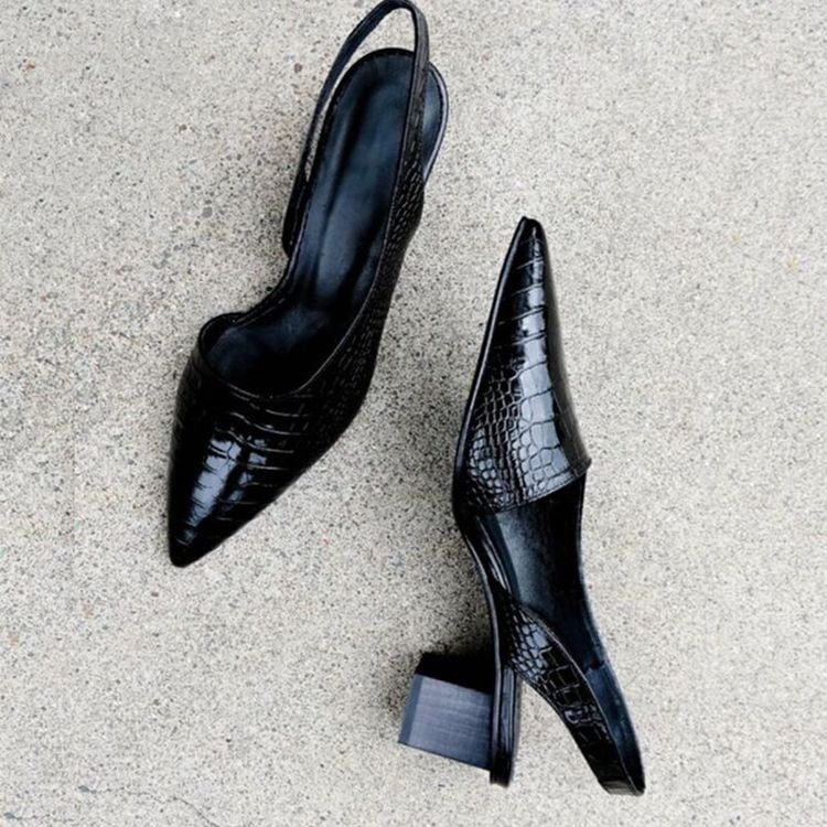 Alexis orthopedic heels styled with tailored trousers for a polished everyday look