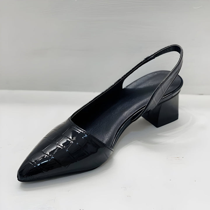 Detail shot of the cushioned insole and supportive structure of Alexis orthopedic heels