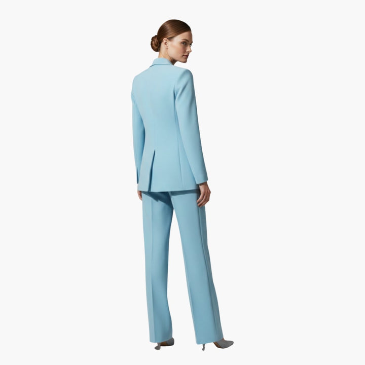 Close-up of the Allegra blazer lapel collar and single-button closure in light blue