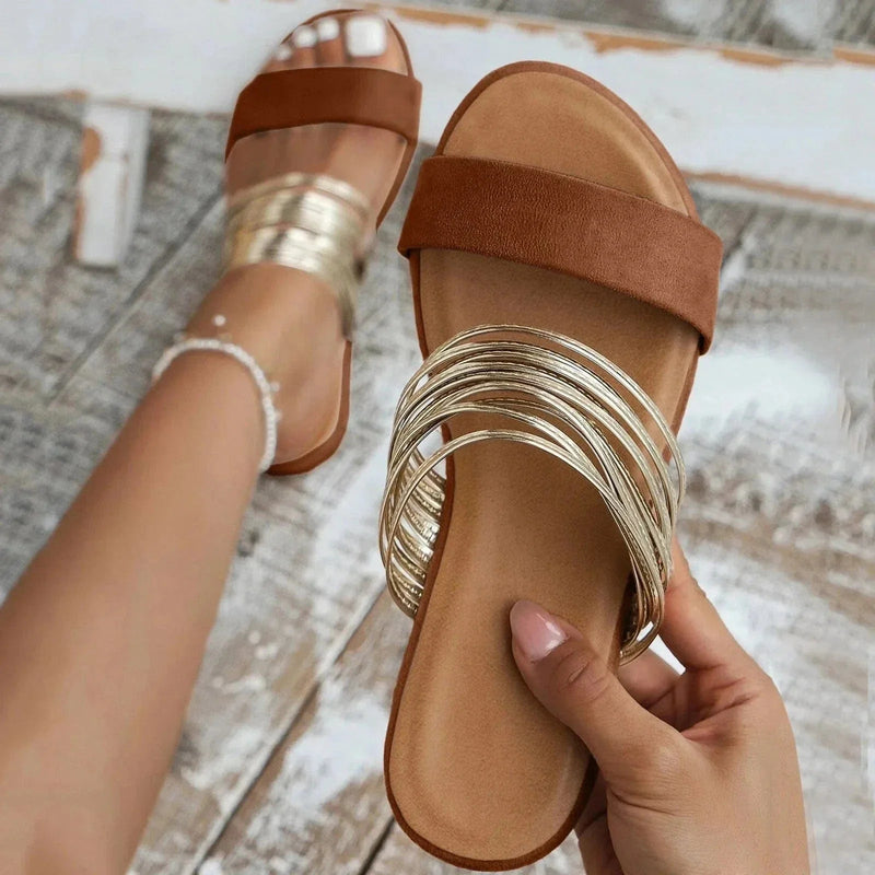 Close-up of Alma sandal in Chestnut Brown showing suede upper texture and cushioned insole detail