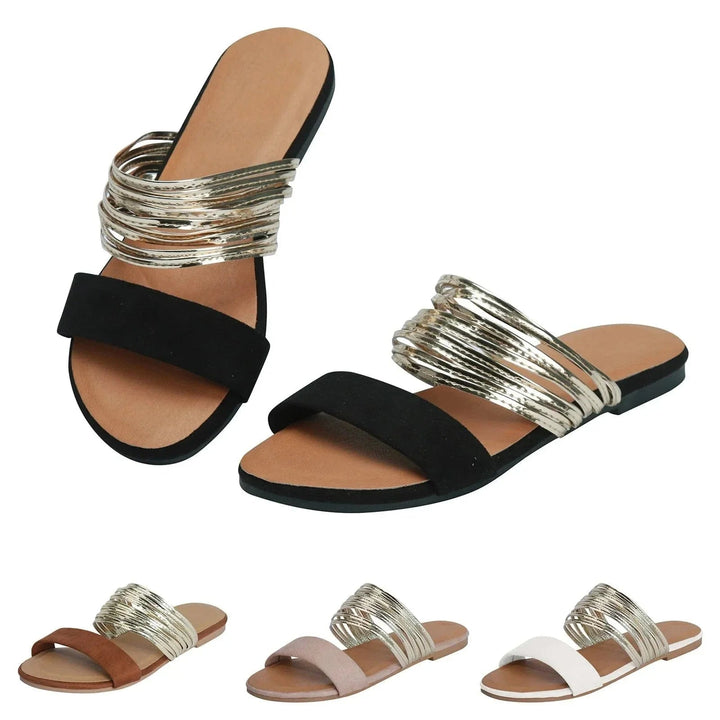 Alma sandal in Cream White showing sole and arch-support cushioning from the bottom