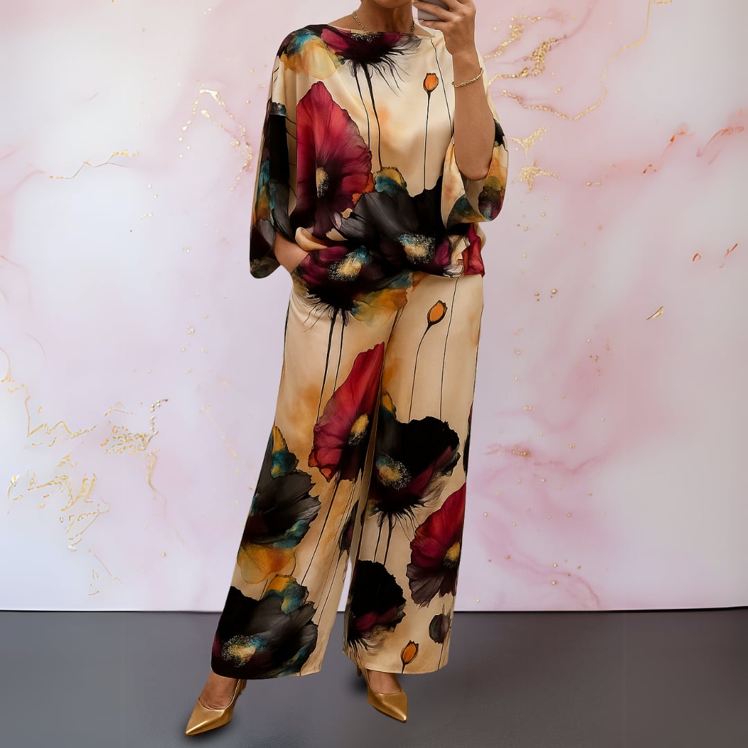 Front view of the Alma-Rose satin two-piece set in jet black showing the flattering silhouette