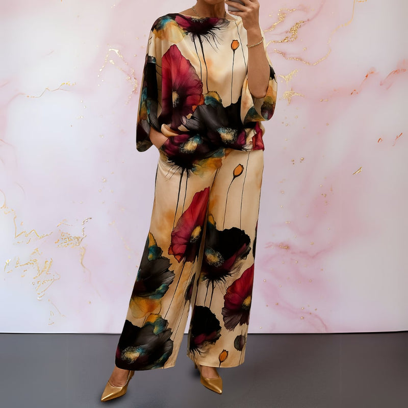 Front view of the Alma-Rose satin two-piece set in jet black showing the flattering silhouette
