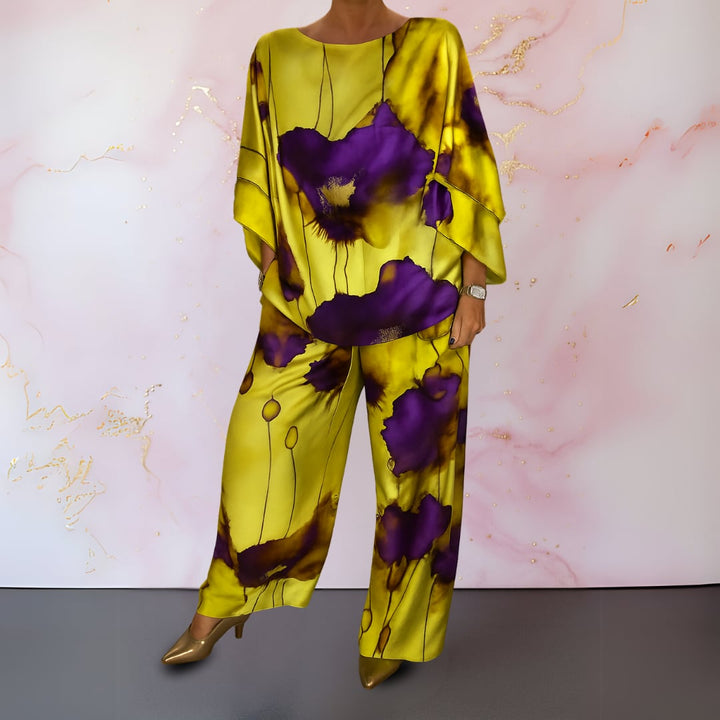 Model wearing the Alma-Rose satin two-piece set in lemon yellow against a neutral background