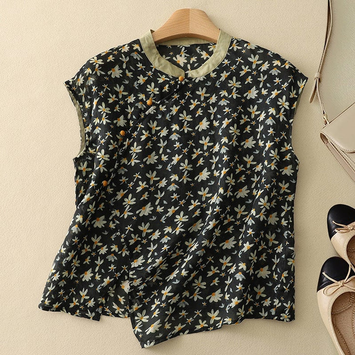 Detail shot of the mandarin collar and delicate floral pattern on the Amanda sleeveless top