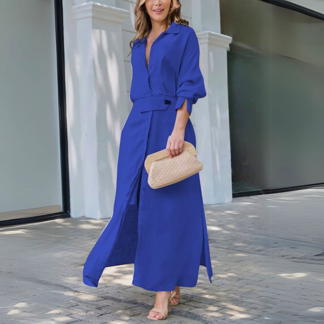 Model wearing the Amara elegant maxi dress in a relaxed summer outdoor setting