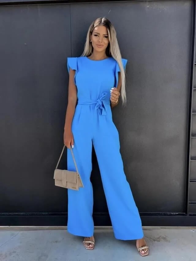 Amber belted wide-leg jumpsuit in pink, full-length view with ruffle shoulder detail