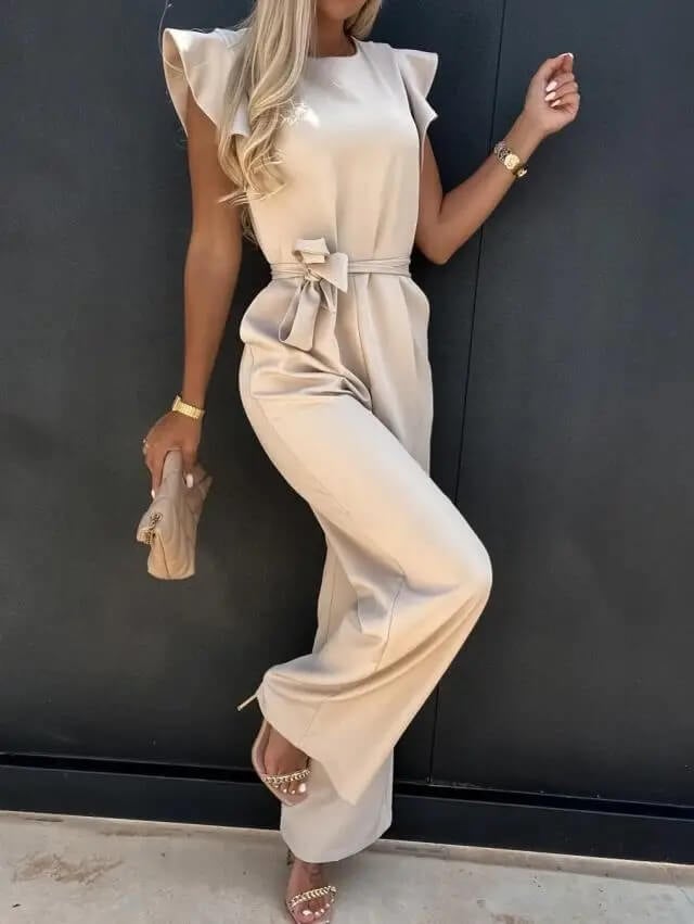 Side view of the Amber wide-leg belted jumpsuit showing elongating floor-length leg line