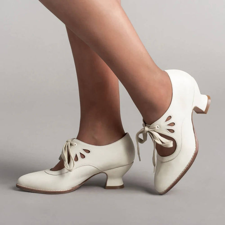 Amelia vintage pin-up heels in crimson red showing mid-height heel and ankle strap detail