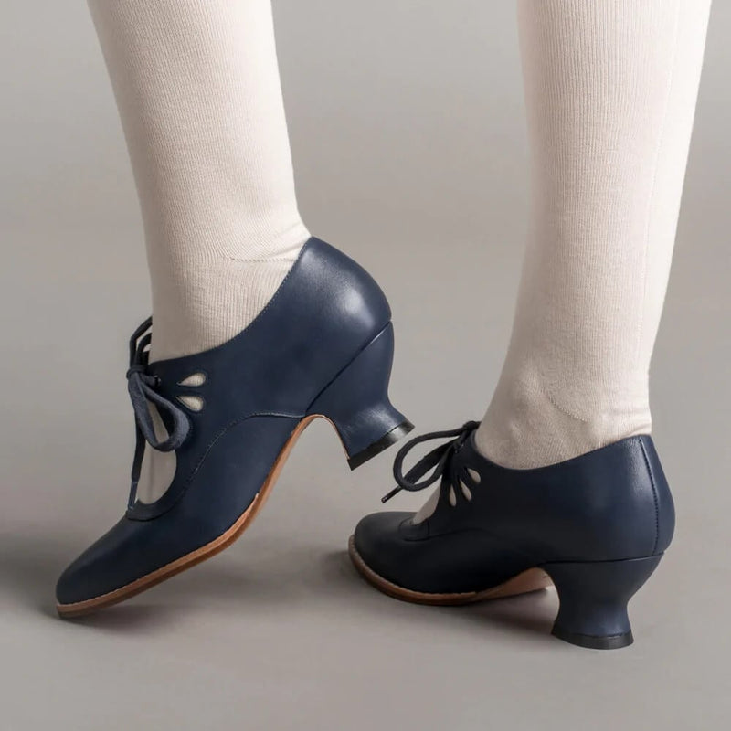 Amelia vintage heels in brown displayed at an angle to show sole and heel height