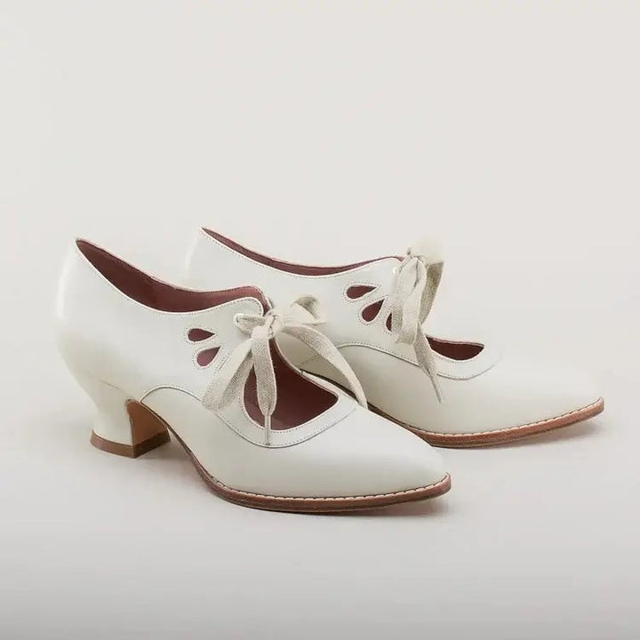 Amelia heels in white showing cushioned insole and ergonomic footbed