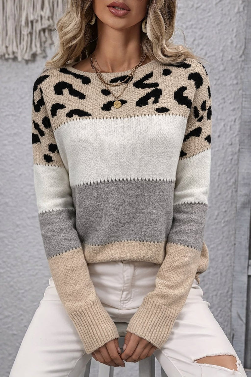 Model wearing the Amelia elegant sweater in pink styled with casual bottoms