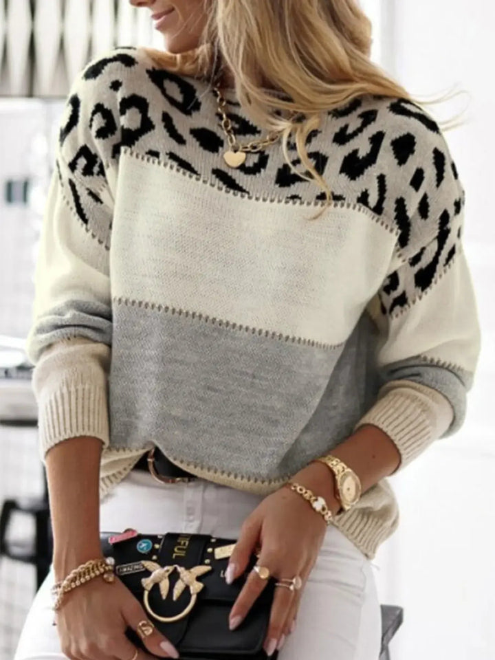 Full-length front view of the Amelia elegant sweater in beige on a model